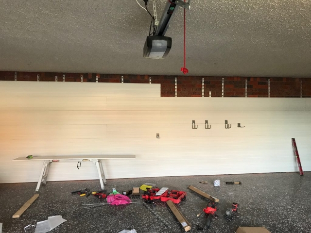 StoreWALL Brite White Panels on Brick Wall