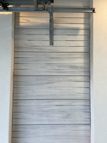 Whitewood Wall Panel Installation on a Brick Wall