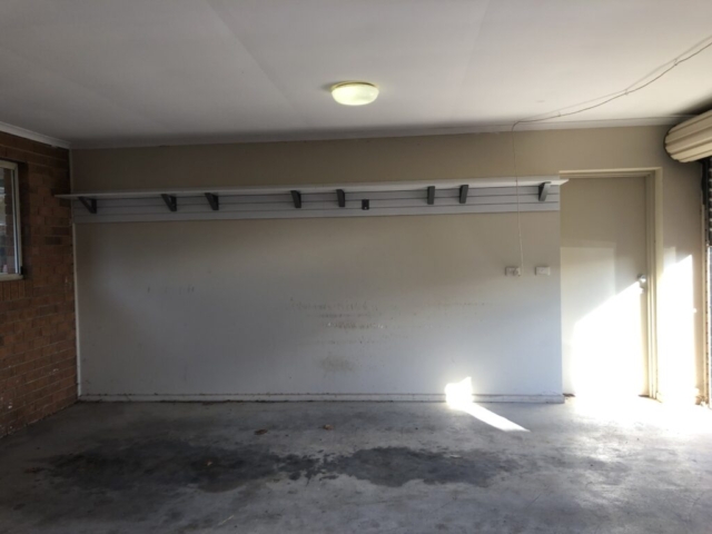 Shelves on a Plaster Wall