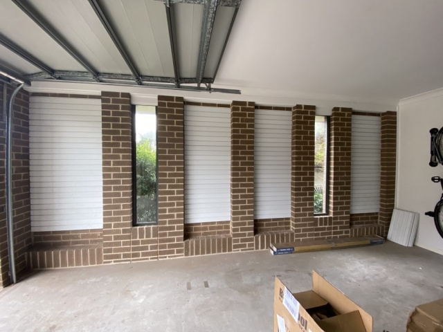 Wall Panels on a Brick Wall
