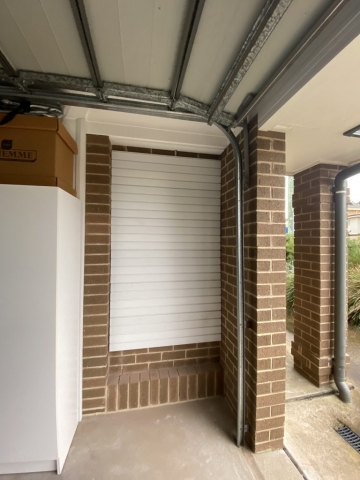 Wall Panels on a Brick Wall