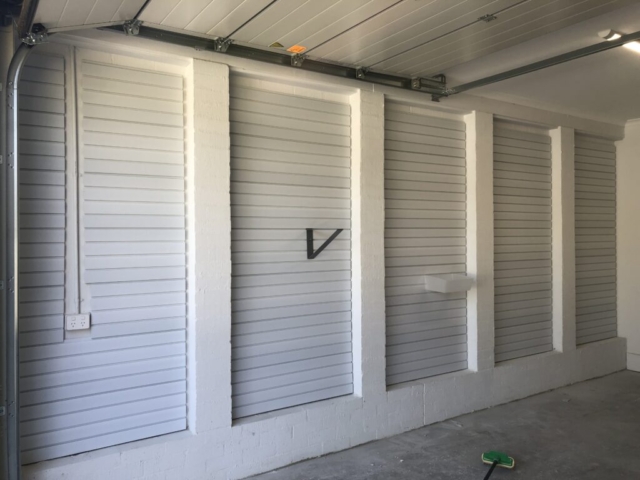 5 x 1m brick wall sections covered with Brite White Panels