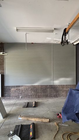 Garage Slatwall on a Brick Wall Garage Slatwall on a Brick Wall